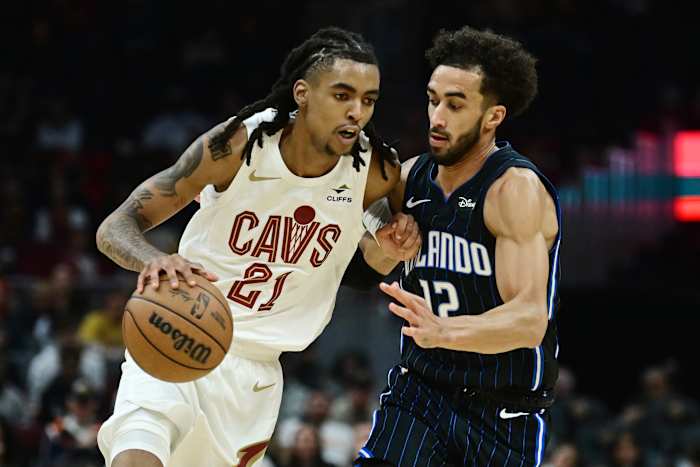 Oct 12, 2023; Cleveland, Ohio, USA; Cleveland Cavaliers forward Emoni Bates (21) drives to the basket against Orlando Magic guard Trevelin Queen (12) during the second half at Rocket Mortgage FieldHouse.